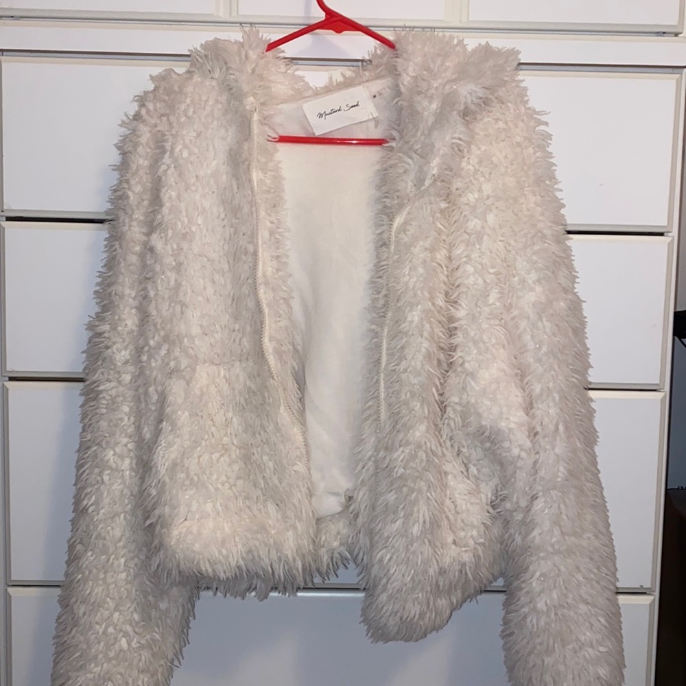 Mustard seed cropped white fuzzy jacket.